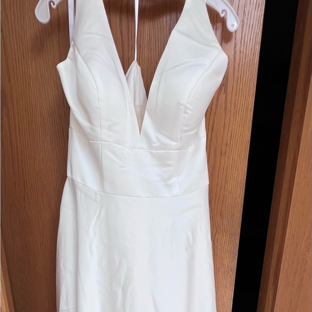 David’s Bridal NWT.  Satin fabric, Ivory/white.  Size 12.  Has not been altered.